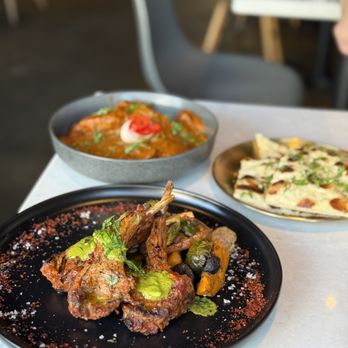 Meesha signature dishes Connaught Butter ChickenAlleppey Fish CurryKalmi Grilled Lamb Chops